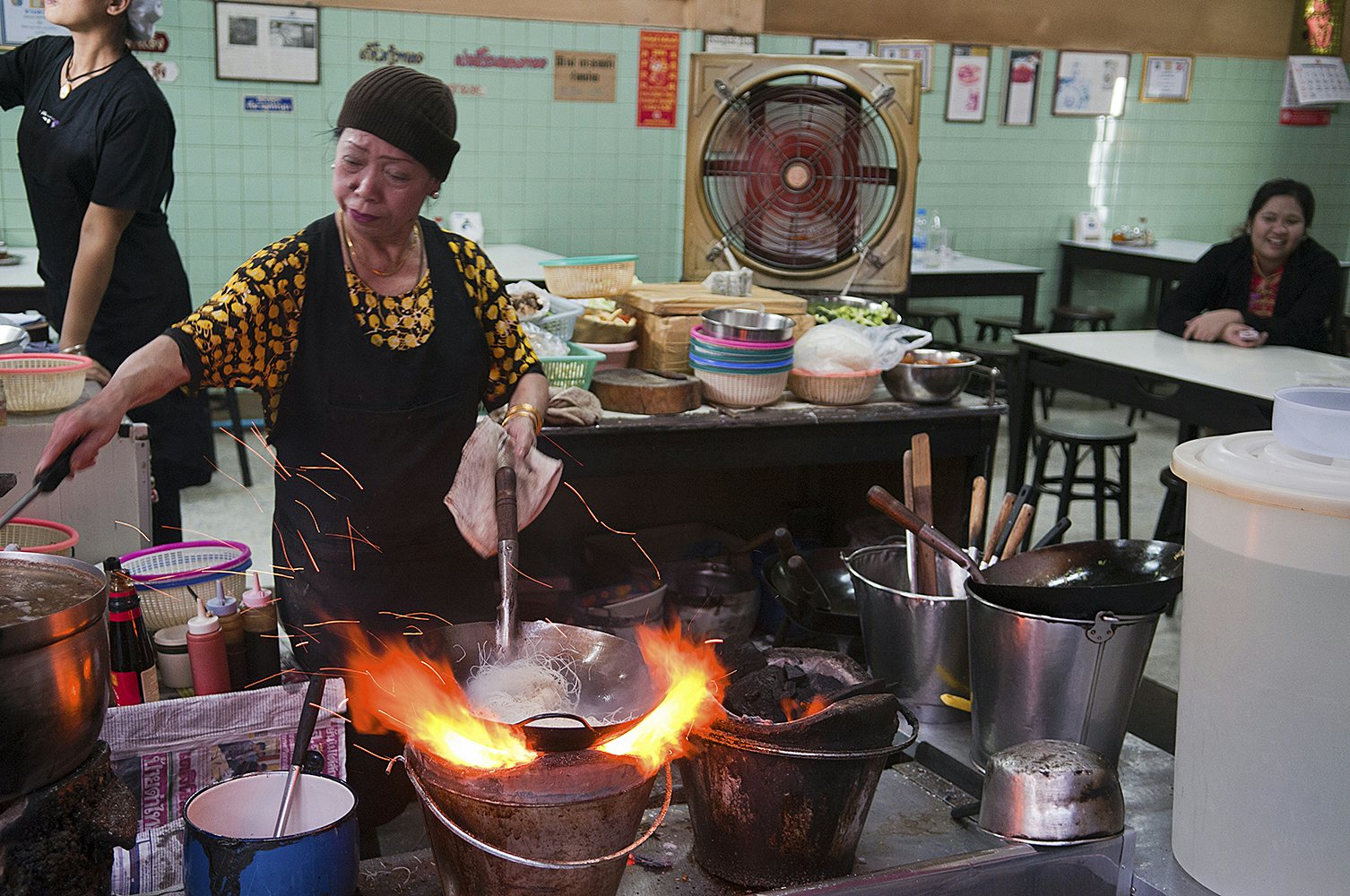 woman cooking noodles at Jay Fai