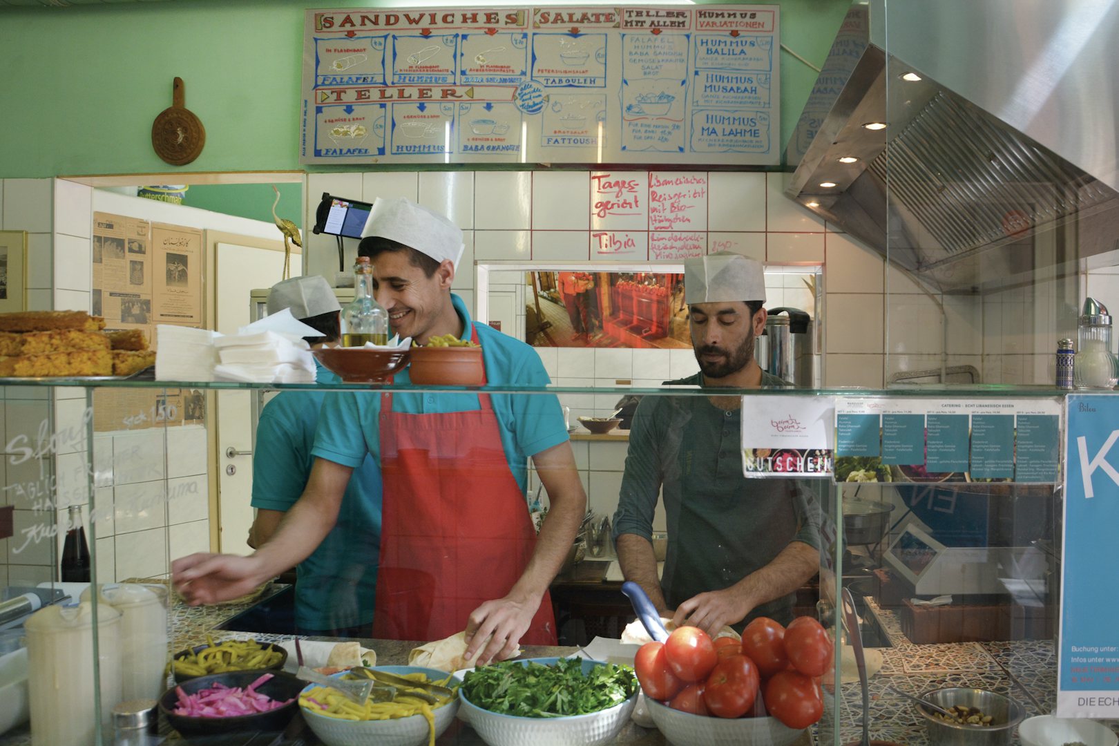 people preparing food at BeirutBeirut restaurant