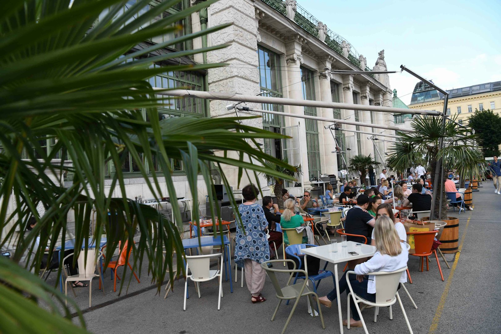 people having drink at the terrace of Palmenhaus