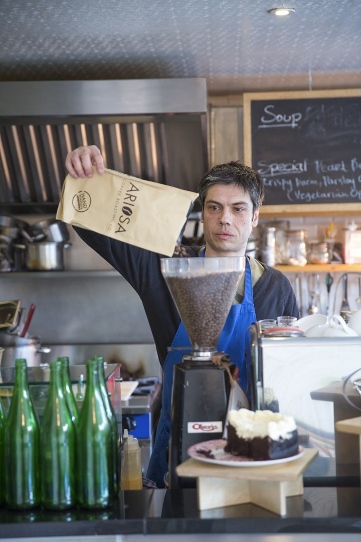 barista blending coffee beans at Cake Cafe Dublin