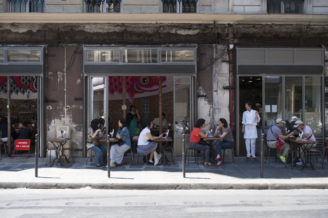 people sitting outside at Kunitoraya