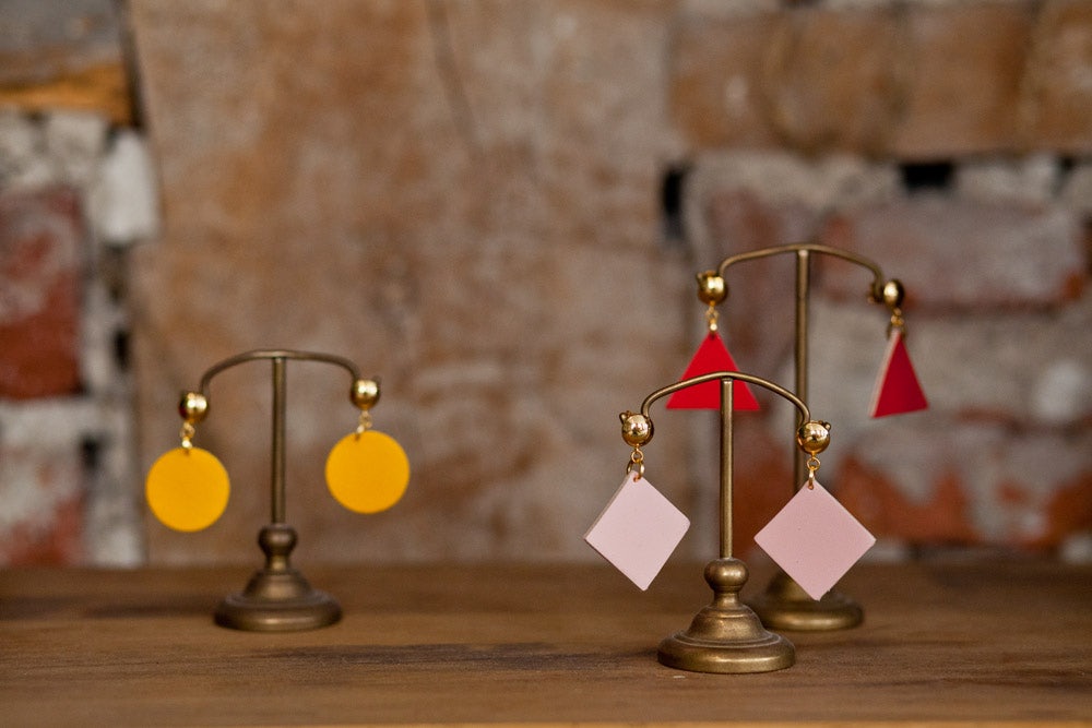 three pairs of earrings at Malababa store