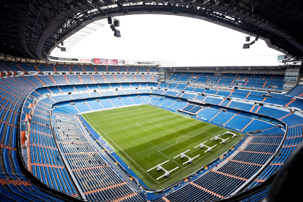 an empty Estadio Santiago Bernabeu in Madrid