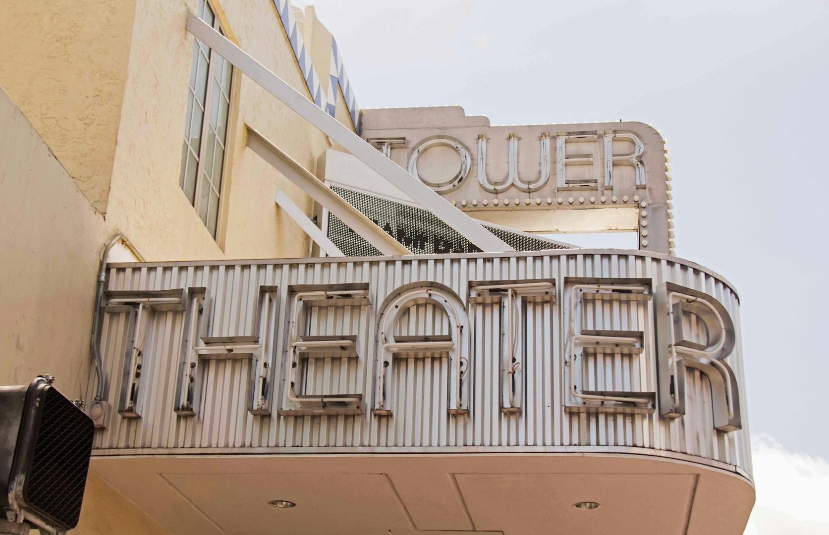 big street sign of the MDC's Tower theatre