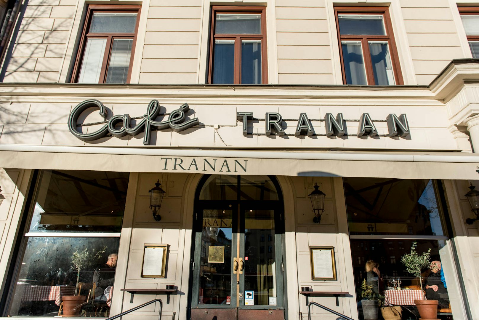 name sign at the front of Cafe Tranan