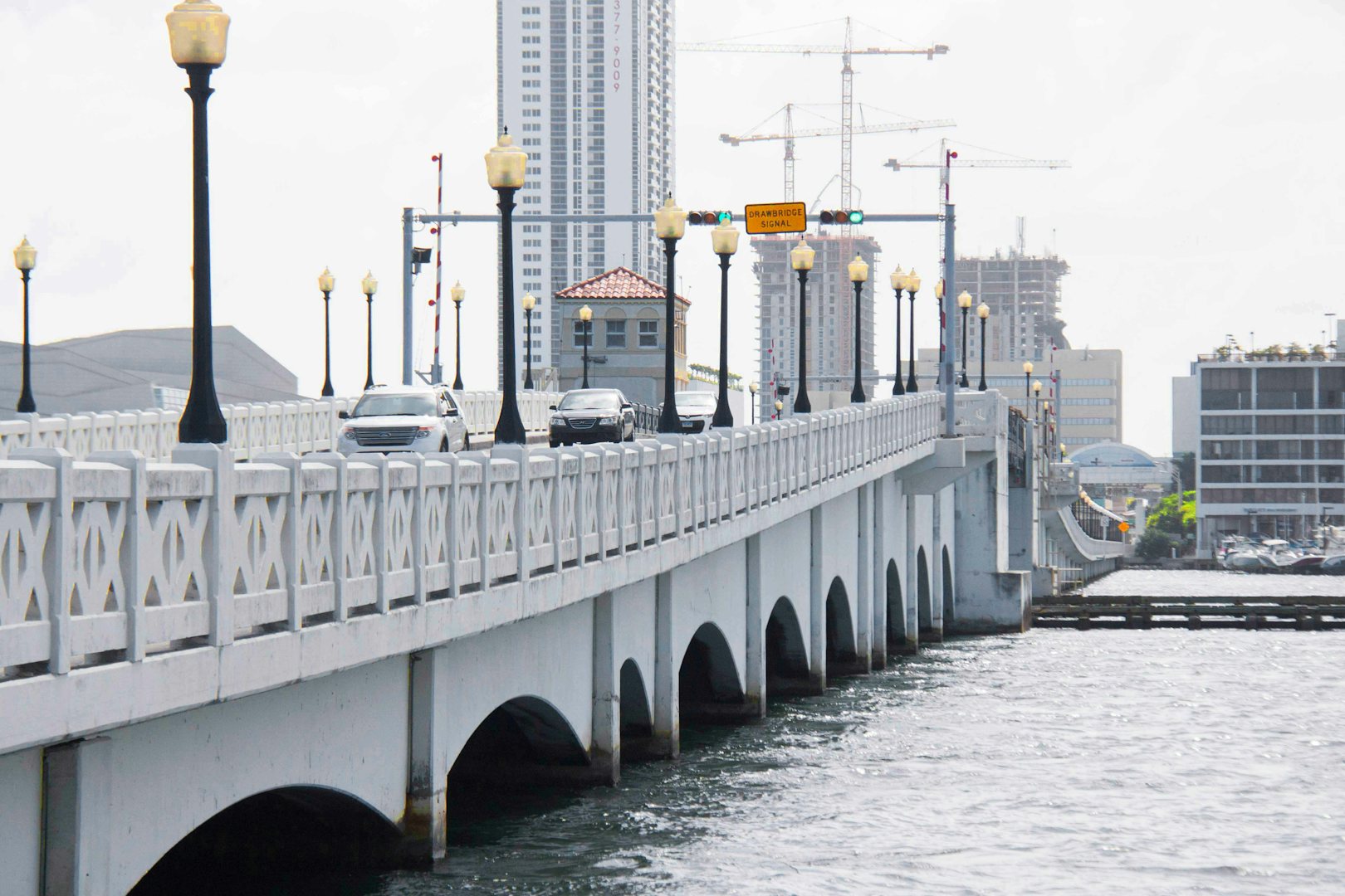 cars driving over the venetian causeway in Miami