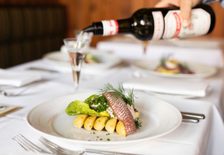 a dish with sea food served at Schonneman