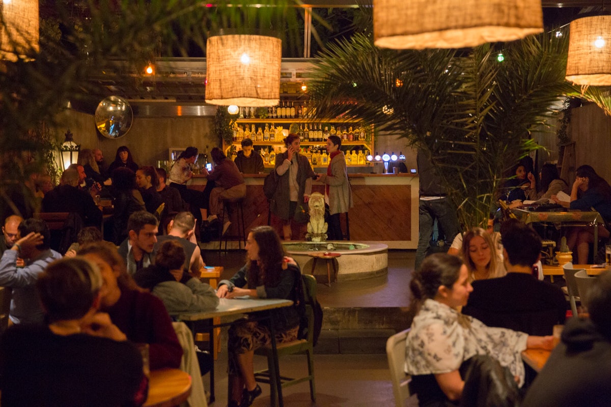 people having a drink at Bina