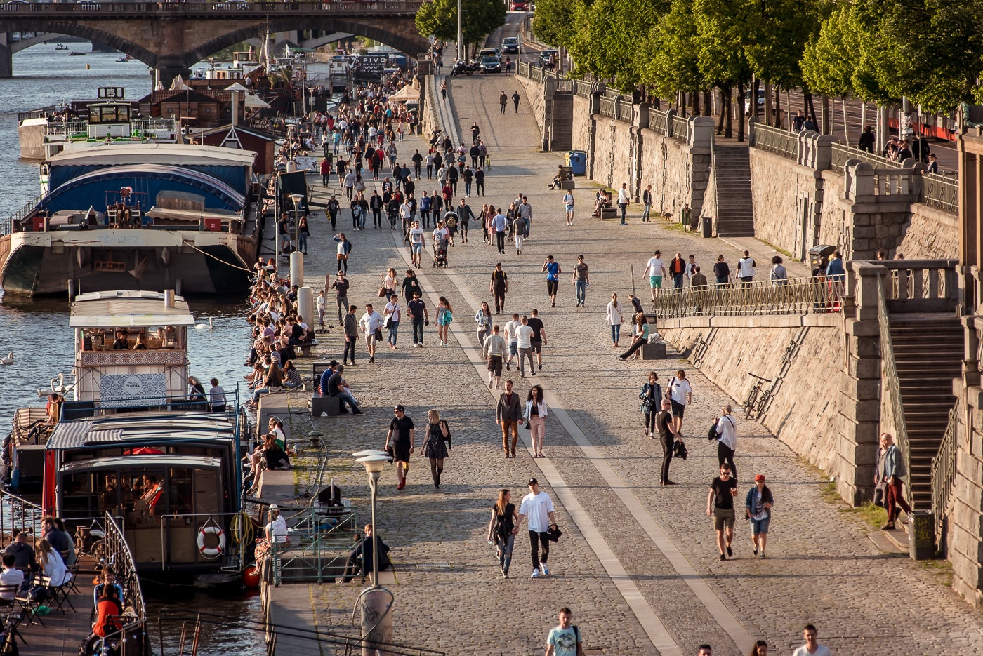 people walking around at Naplavka