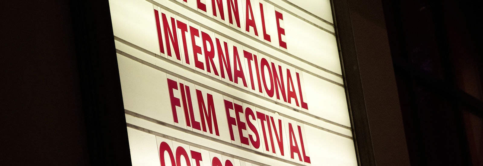 white and red sign of the Viennale