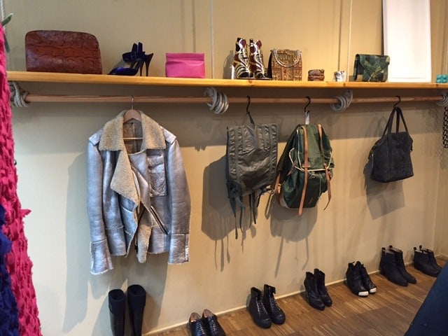 a sliver jacket and accessories displayed at Das Neues Schwarz Vienna