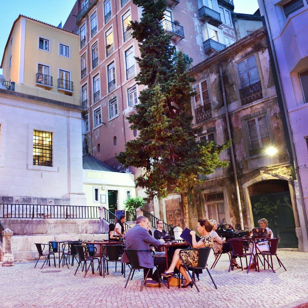 people drinking outside at Chafariz do Vinho in Lisbon