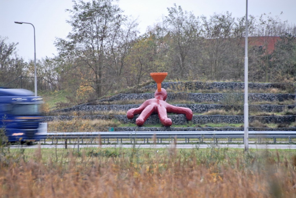 Big Funnel Man besides the highway