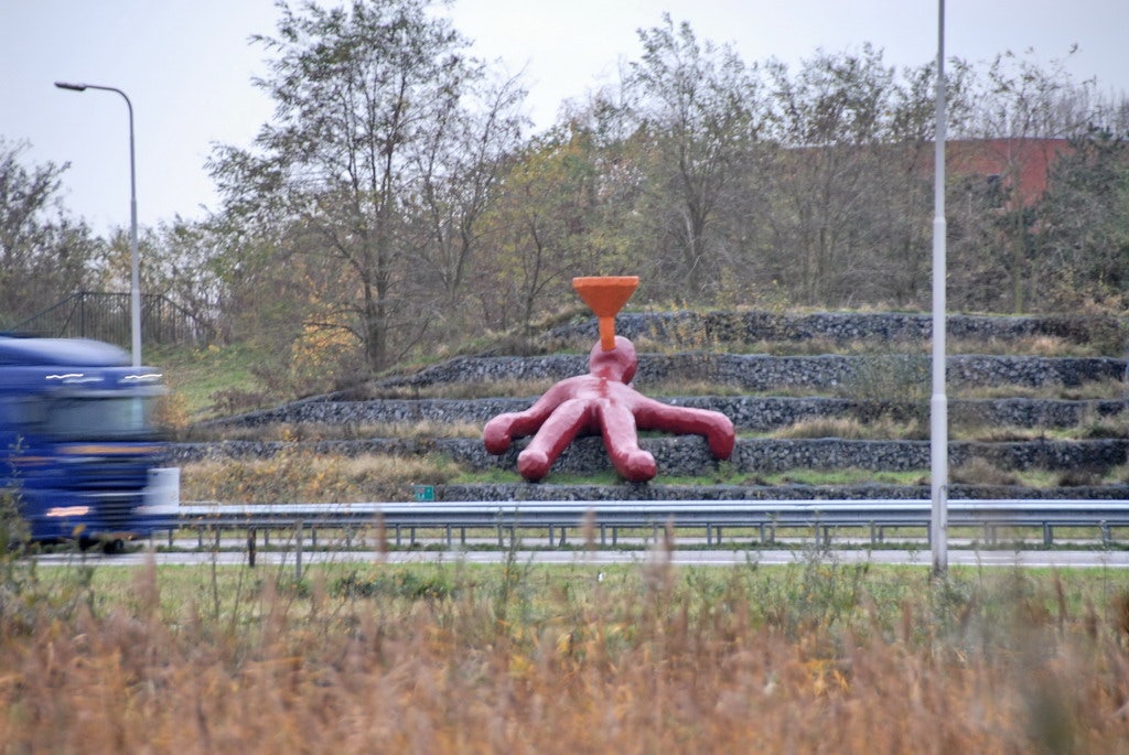 Big Funnel Man besides the highway 