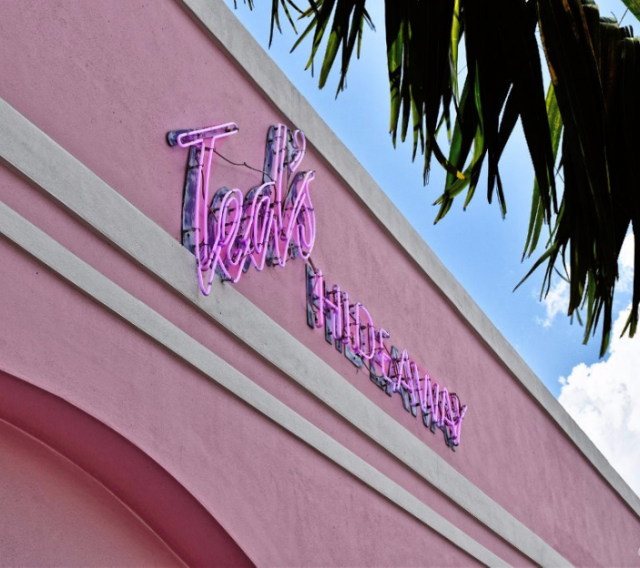 pink neon sign of Ted's Hideaway Miami