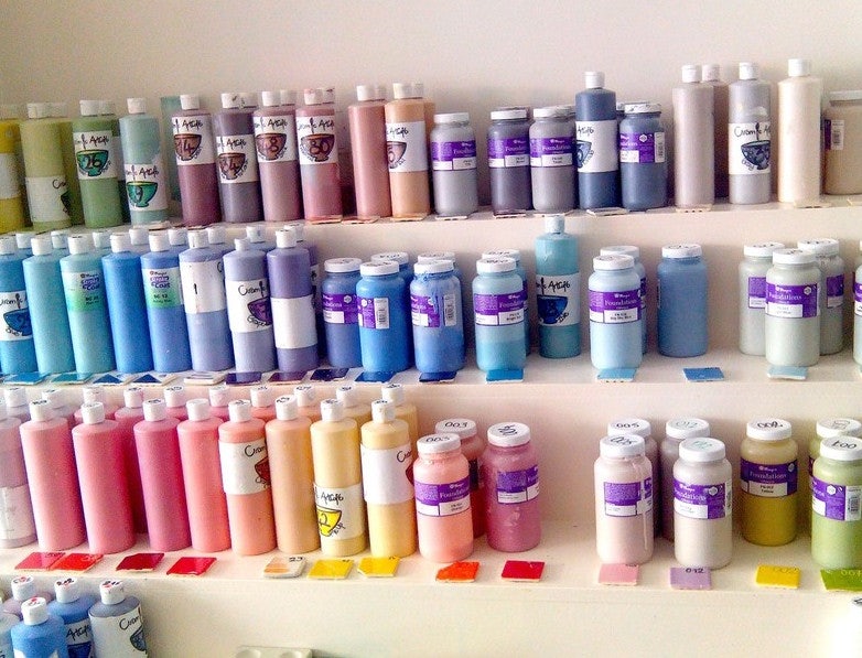 various colours of paint at C.Ramic art café