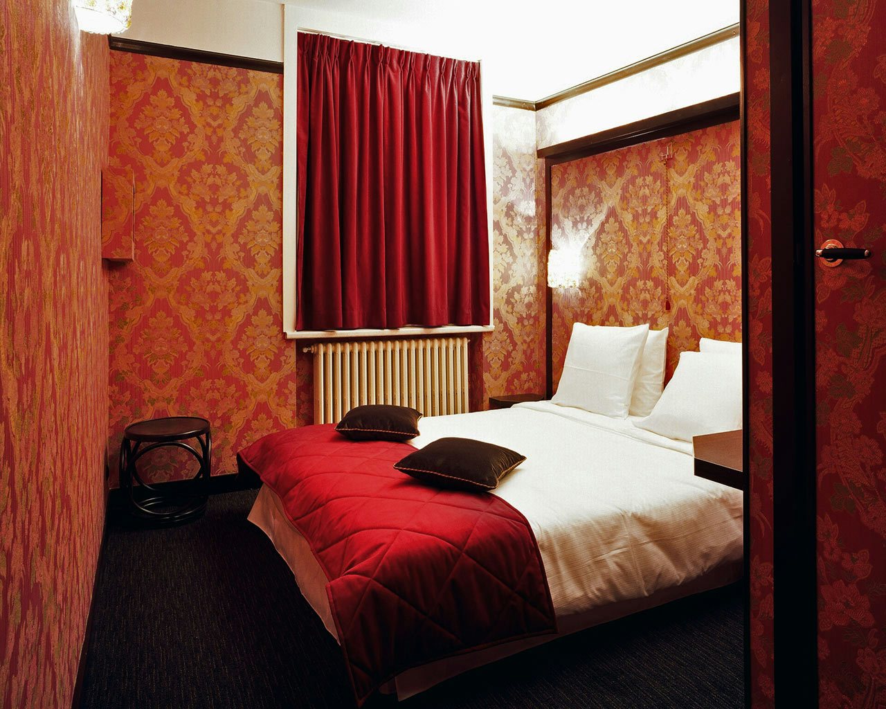 red room at Le Berger hotel