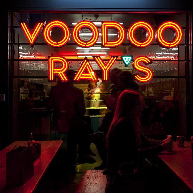 neon sign of Voodoo Ray's