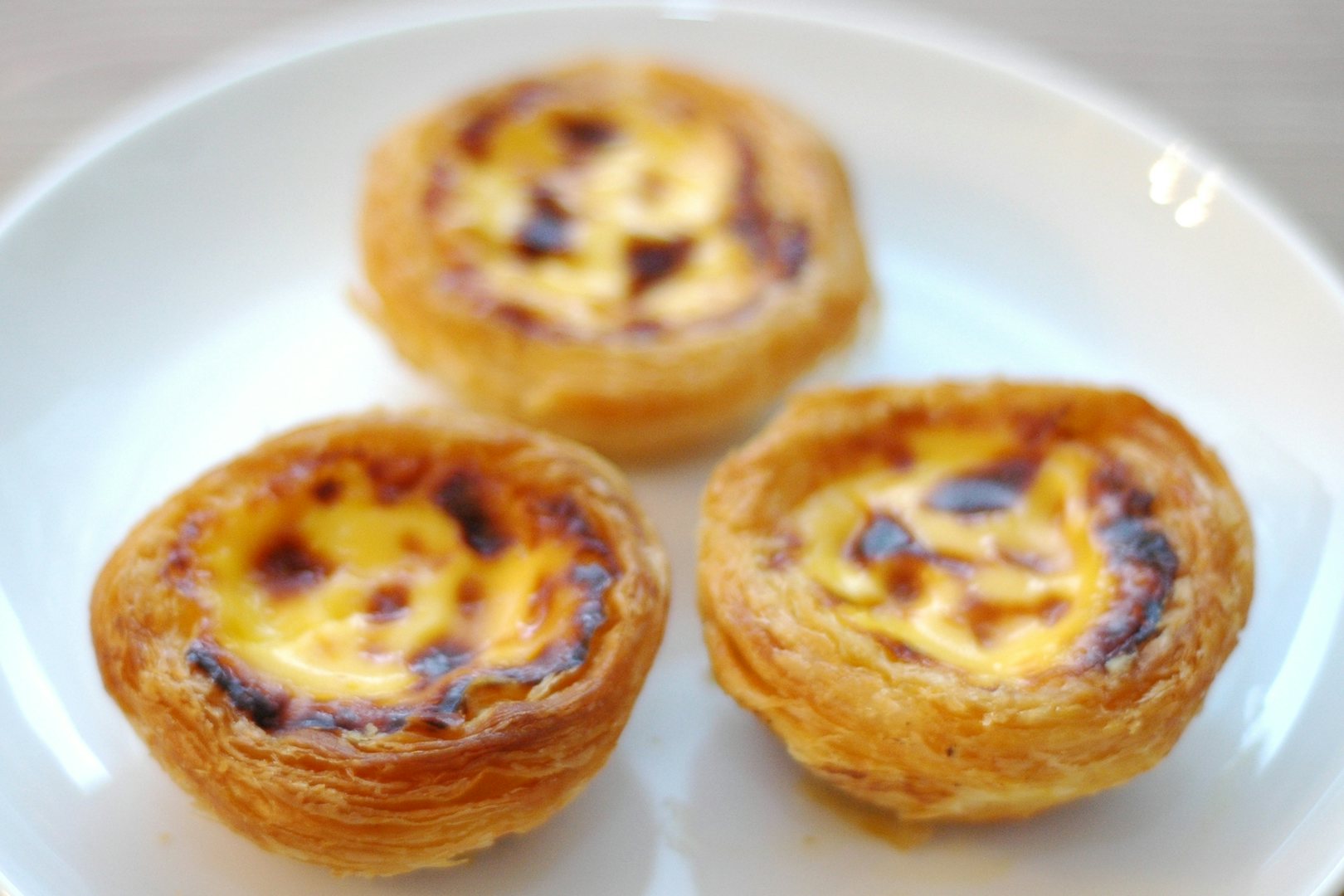 three pasteis de nata from Pastelaria Cristal