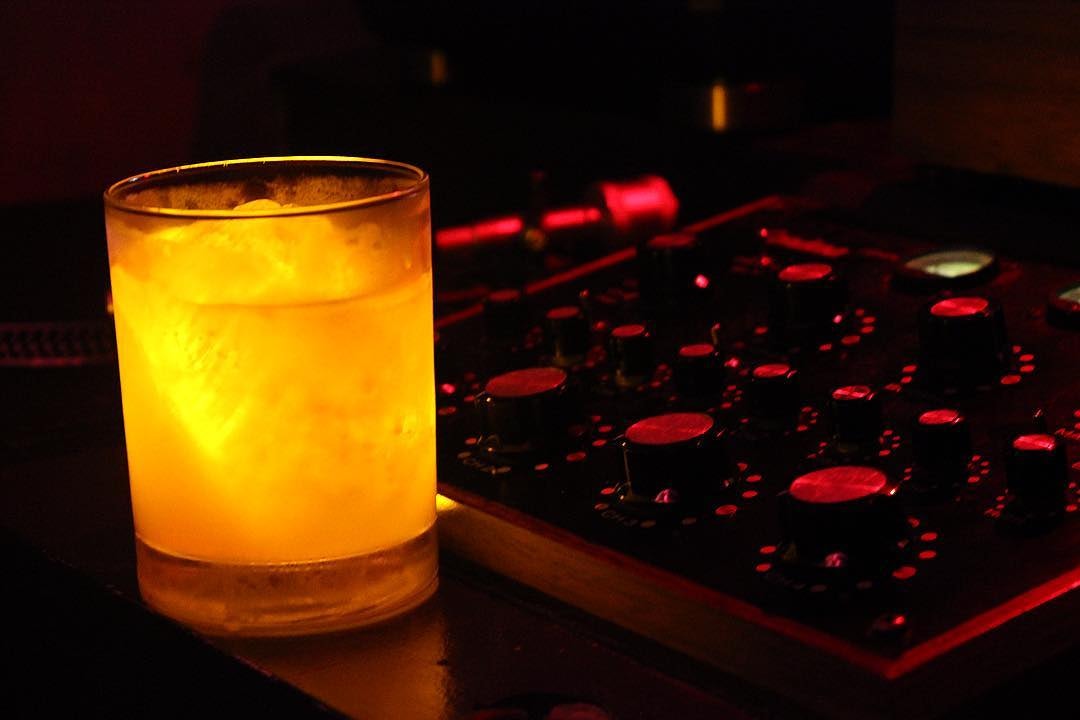 a luminescent cocktail at Jupiter Disco