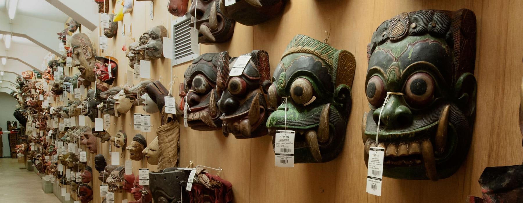 historic masks hanging at Wereldmuseum