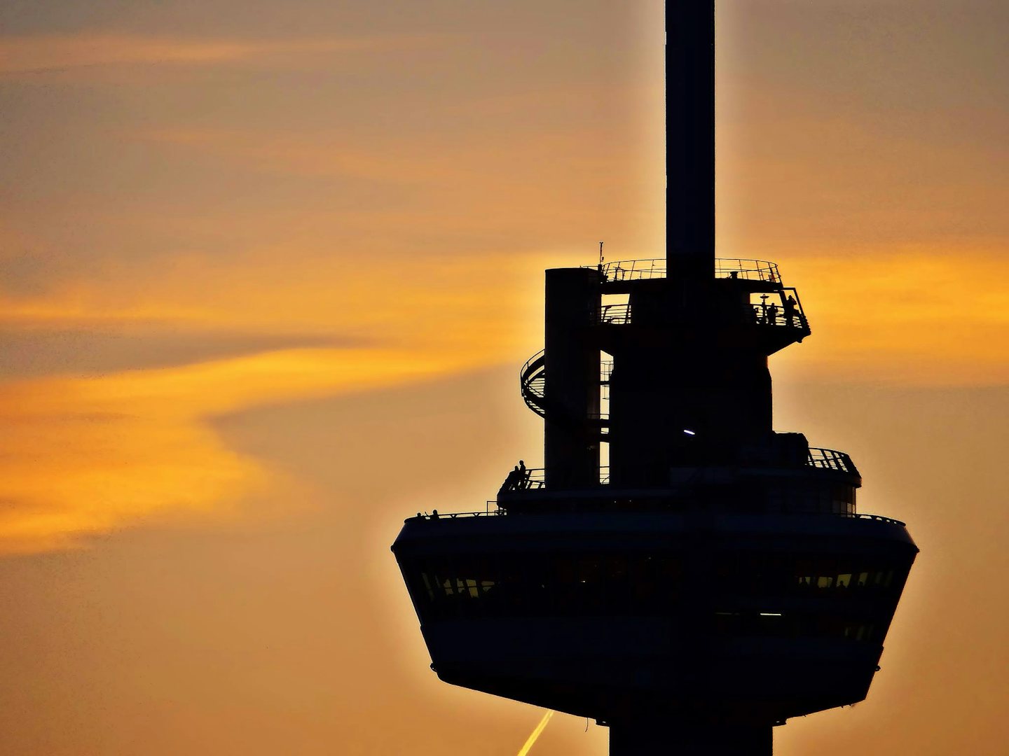 Euromast against an orange sky 