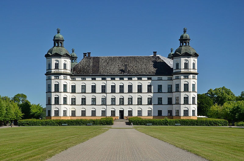 exterior of the Skoklosters Slott and a perfectly mowed lawn