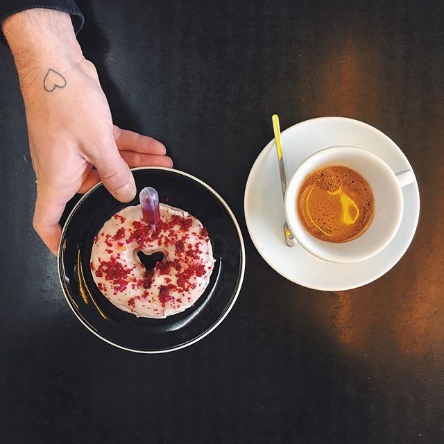 coffee and donut from Black & Yellow Coffee Bar