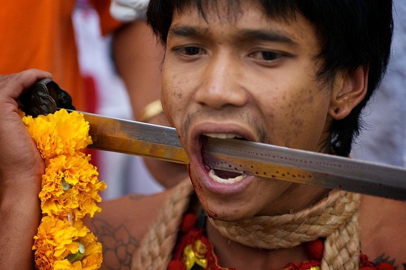 participant at the Vegetarian Festival Thailand