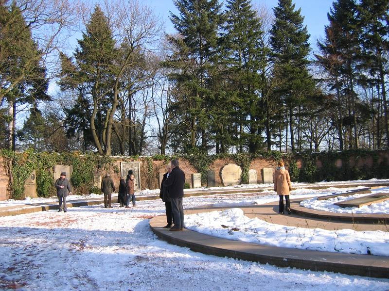 people on a snow white day at Central Cemetery Friedrichsfelde