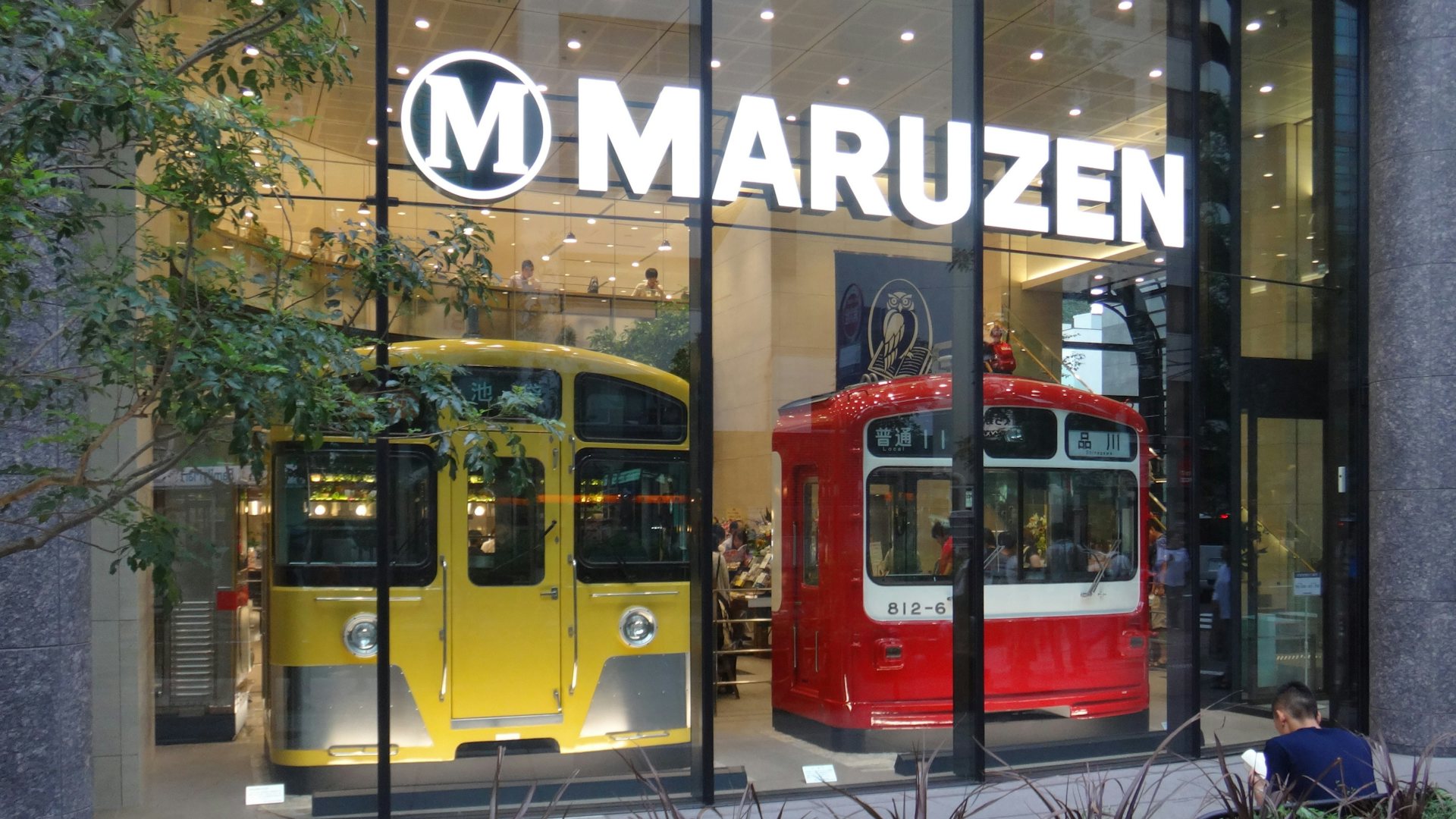 two tram carriages in the window display of Maruzen Ikebukuro