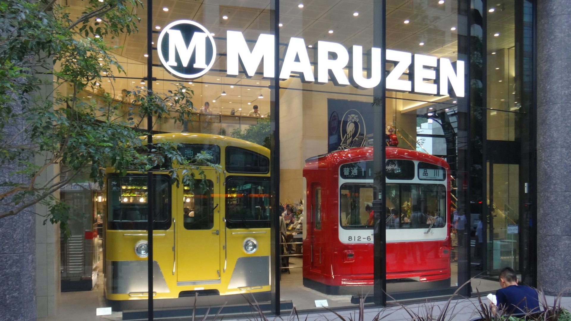 two tram carriages in the window display of Maruzen Ikebukuro 