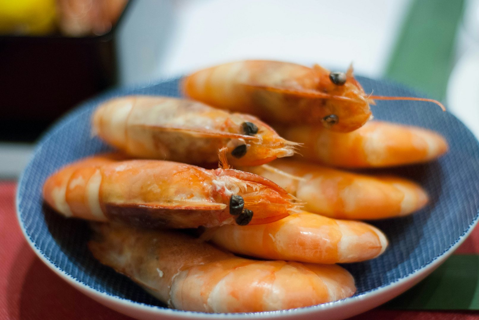 a plate of cooked shrimps