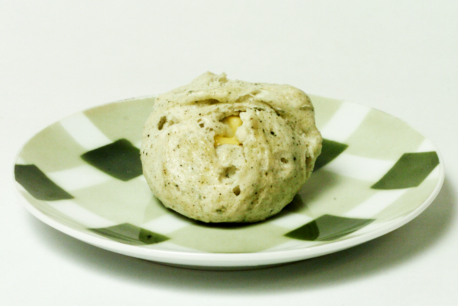 a green coloured bun on a green plate from Mugimaru 2