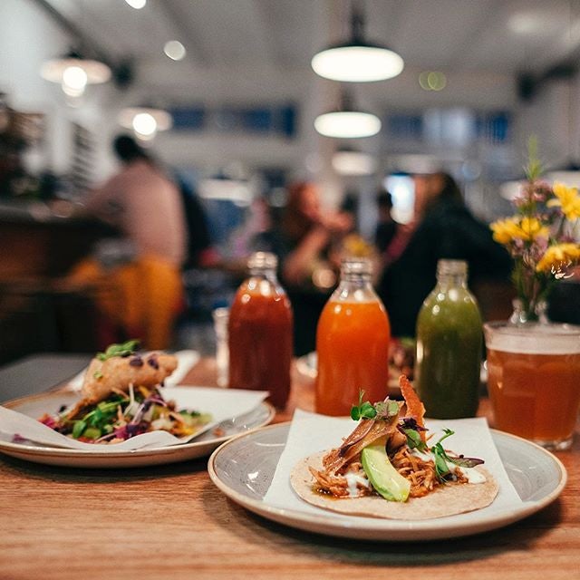 two plates with mexican food at Caravelle restaurant
