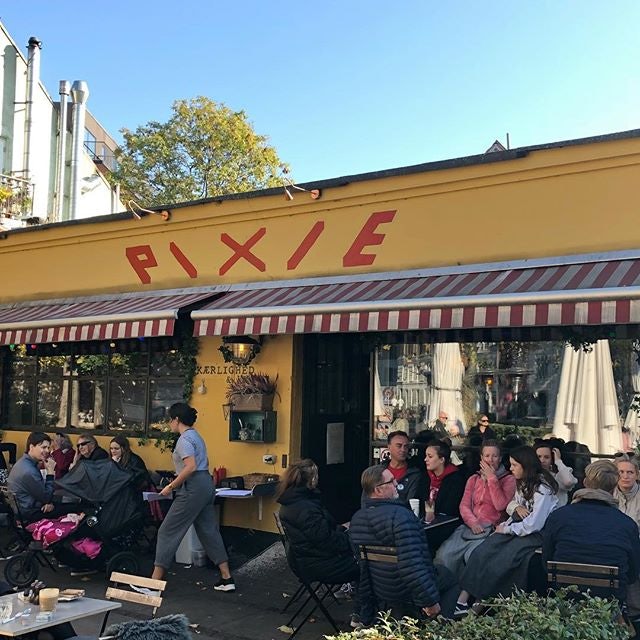 people sitting outside at Café Pixie