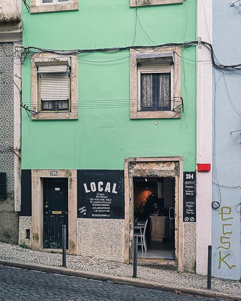 mint green exterior of restaurant Local