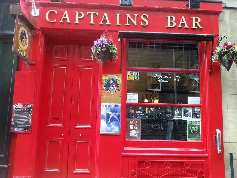 total red façade of the Captain's bar in Edinburgh