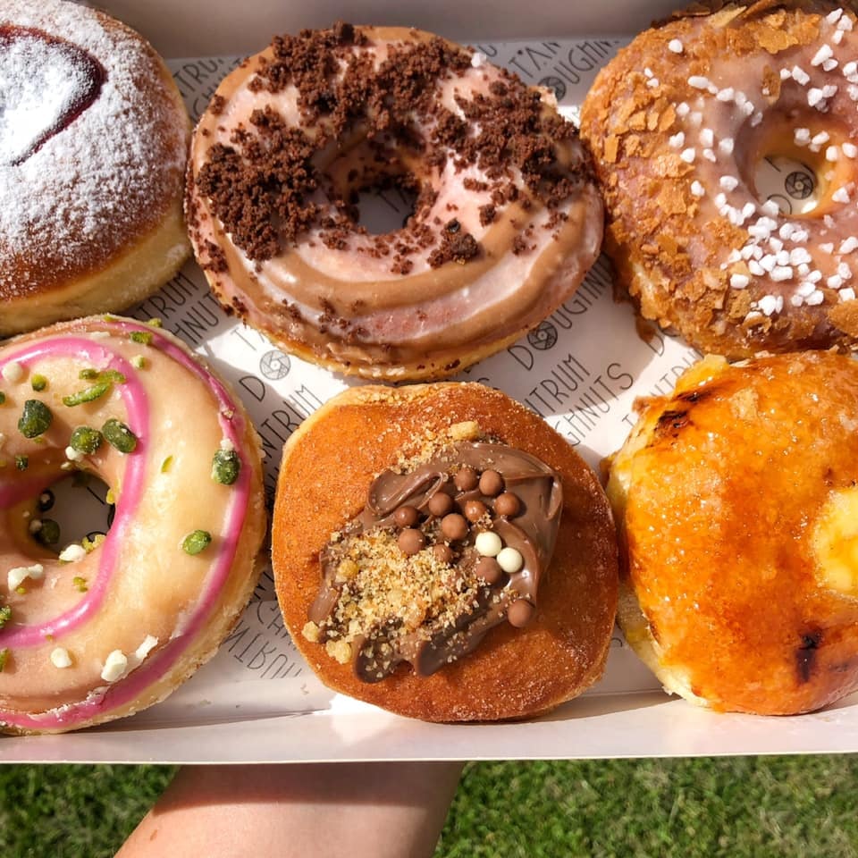 a box of frosted doughnuts from Tantrum in Glasgow