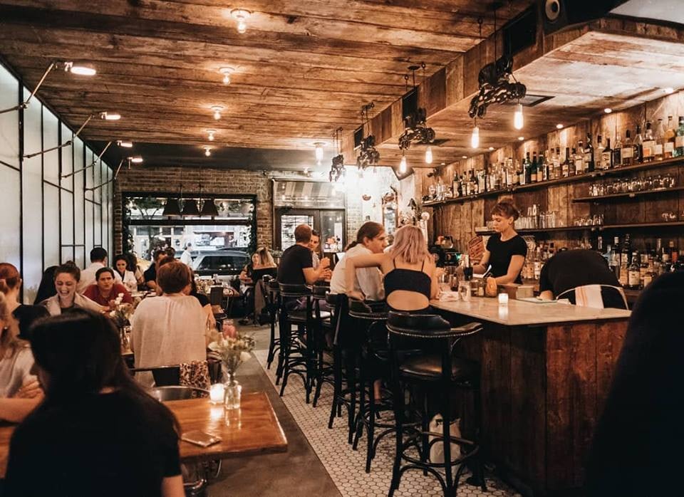 people dining at vegetarian restaurant Feast
