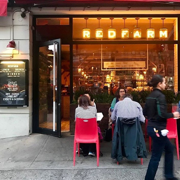 people seated outside Red Farm