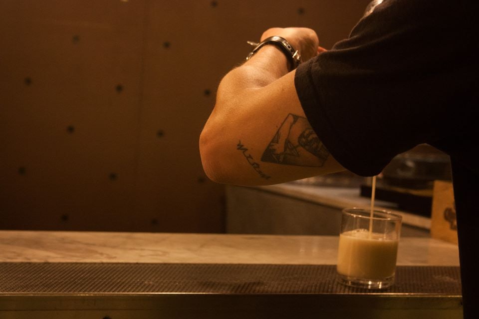 bartender making a cocktail at Il Baretto