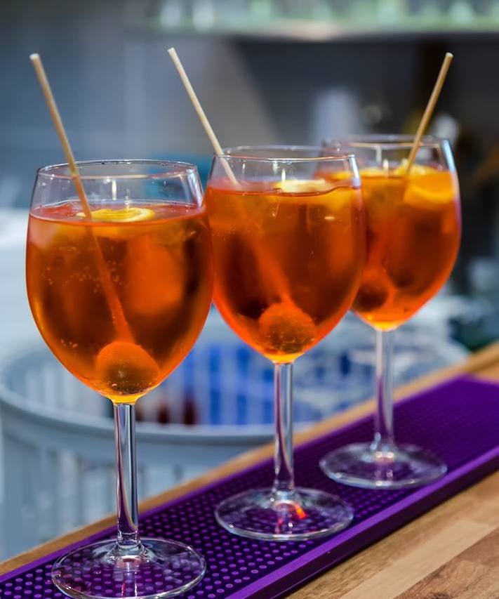 three aperol spritz at L'Ombralonga