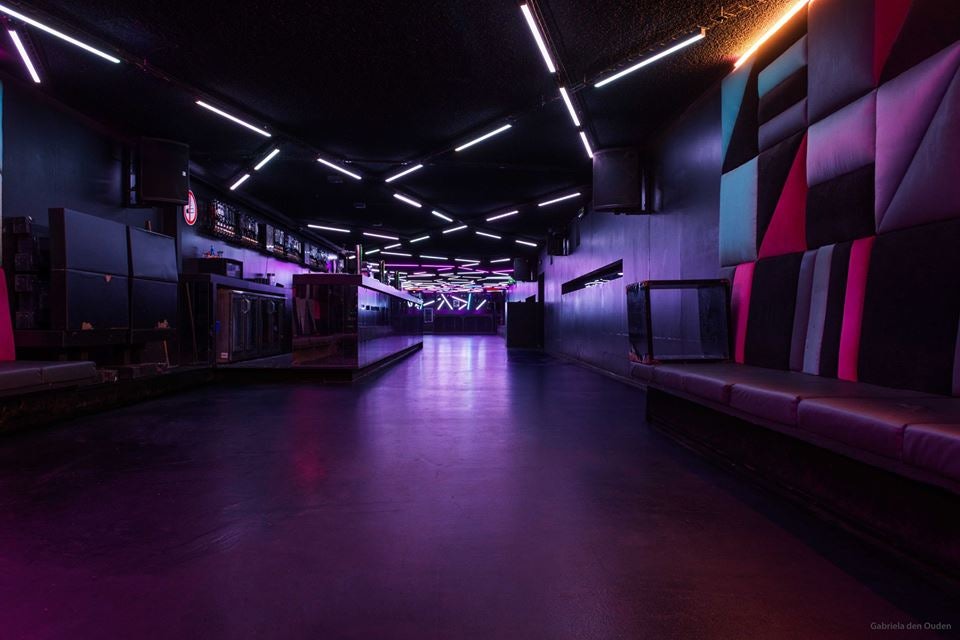 purple interior and lights at club Toffler