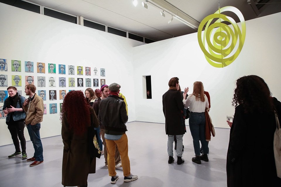 People at an art exhibition at the Dundee Contemporary Arts