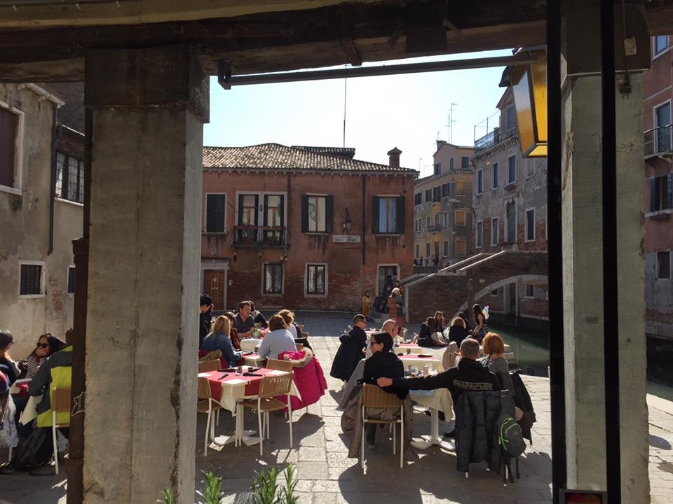 people dining at the terrace of Il Revolo Venice