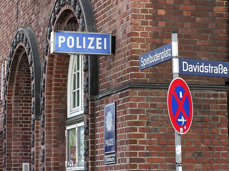 street sign and building of the Davidwache Police Station Hamburg