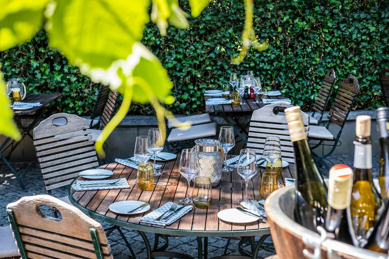 a set table on the terrace of Kleines Jacob wine bar