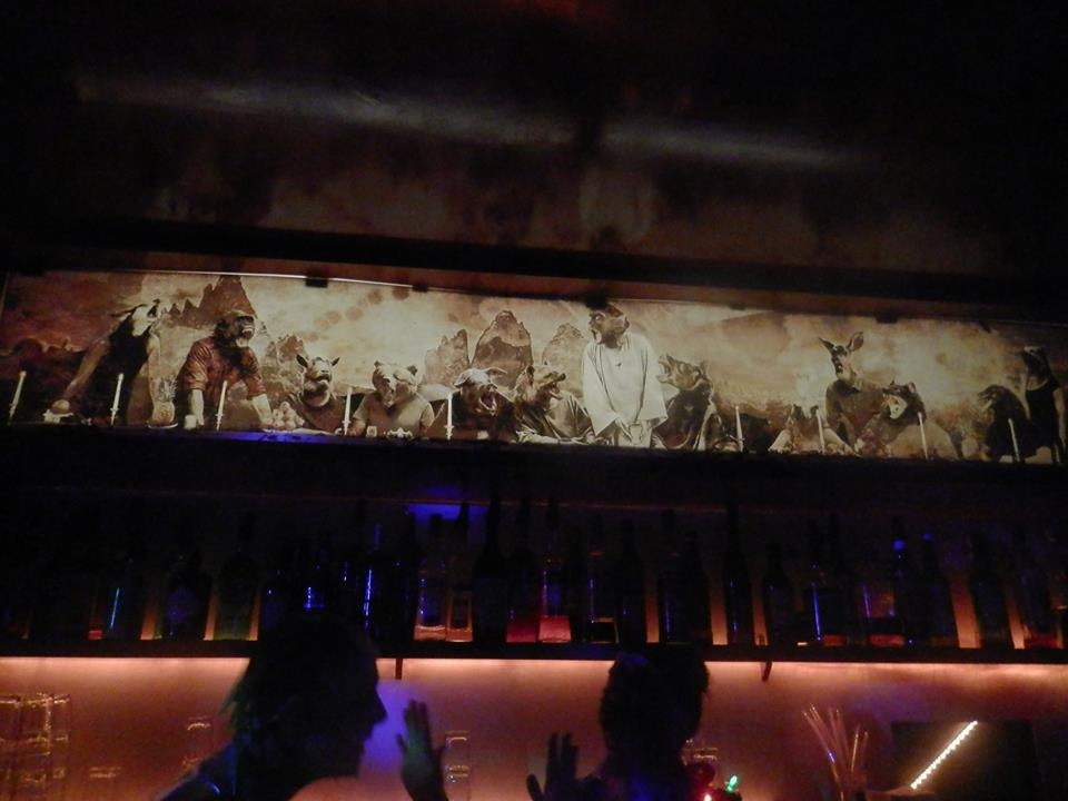 dark interior and wall decoration with animals at Thier bar