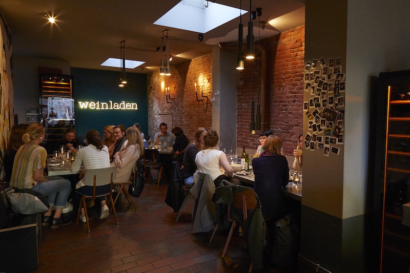 people having a drink at Weinladen Hamburg